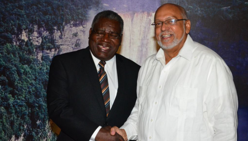 President Donald Ramotar greeting non-resident High Commissioner of Barbados Robert Morris