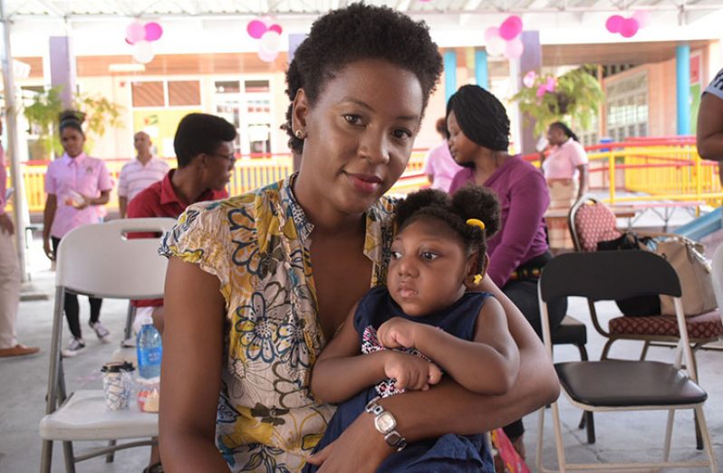 Andrea Garner with her two-year-old daughter who was born with microcephaly