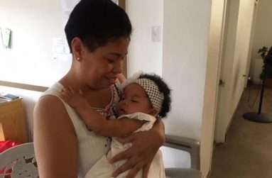 Mother in Pink, Alexis Keizer, cuddles her sweet pink bundle of joy on Mother's Day 2018 (Photo by F.Q Farrier)