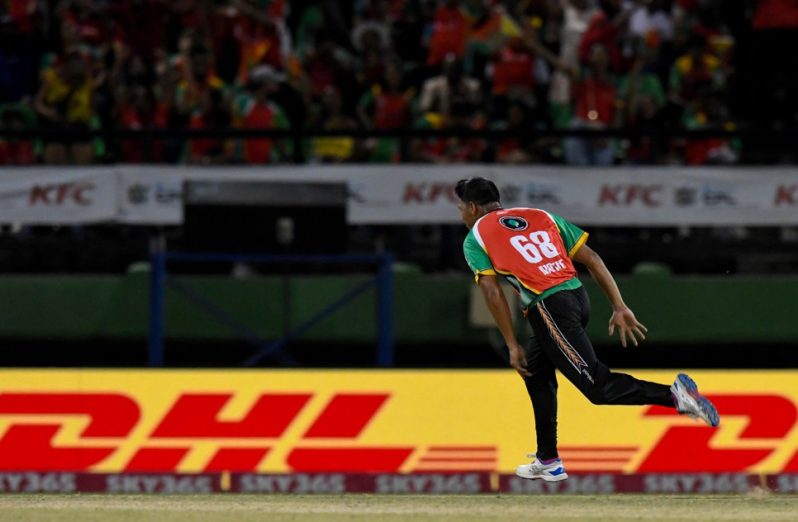 Gudakesh Motie of Guyana Amazon Warriors celebrates the dismissal of Tim David of Saint Lucia Kings during the Men's 2025 Republic Bank Caribbean Premier League Qualifier-1, match 32 between Guyana Amazon Warriors and Saint Lucia Kings at Guyana National Stadium on September 17, 2025 in Providence, Guyana (Photo by Randy Brooks/CPL T20 via Getty Images)