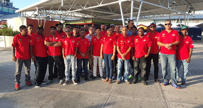 Team Guyana pose for a picture at the Norman Manley International Airport Jamaica. (Stephan Sookram photo)