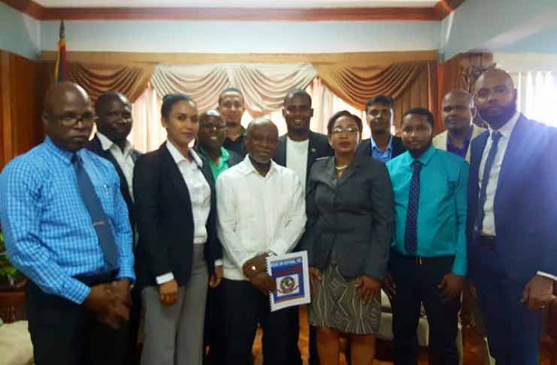 MOVE ON GUYANA Board Members pose with Vice-President and Minister Of Foreign Affairs Hon. Carl Greenidge following their meeting