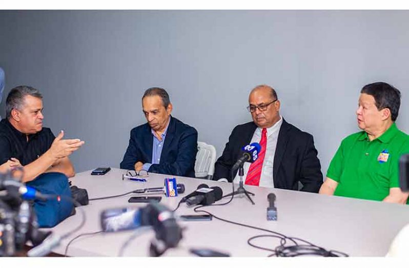 Movie Towne owner Derick Chin (first from right) and other executives of the Private Sector Commission (PSC) during Tuesday’s news conference