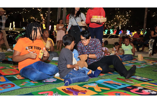 Persons of all ages and backgrounds on Sunday gathered at the One Guyana Kitchen on Main Street opposite State House for a movie night. They were joined by the Minister of Tourism, Industry and Commerce, Susan Rodrigues (Photos: Ministry of Tourism, Industry and Commerce/Facebook)