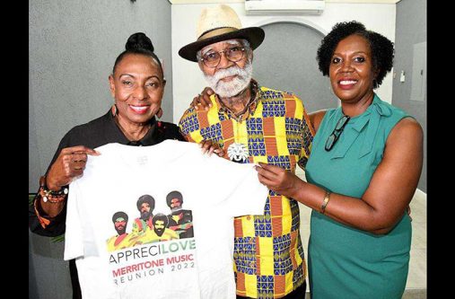 Monte Blake and his daughter Monique (right) present a branded T-shirt to Entertainment and Culture Minister, Olivia "Babsy" Grange (Jamaica Observer photo)