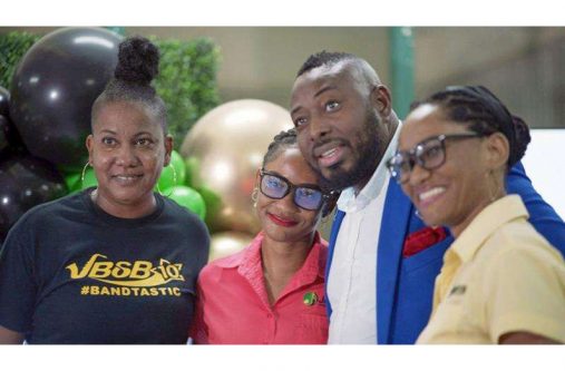 Rayven Amani (left), founder of the Jamaica Best School Band (JBSB) competition; Sana (second right) and Safa Bashir, of Jamaica Music Society, share a photo op with Ewan Simpson, chairman of the Jamaica Reggae Industry Association, on the occasion of the launch of the 2023 season of the JBSB at Edna Manley College of the Visual and Performing Arts.
