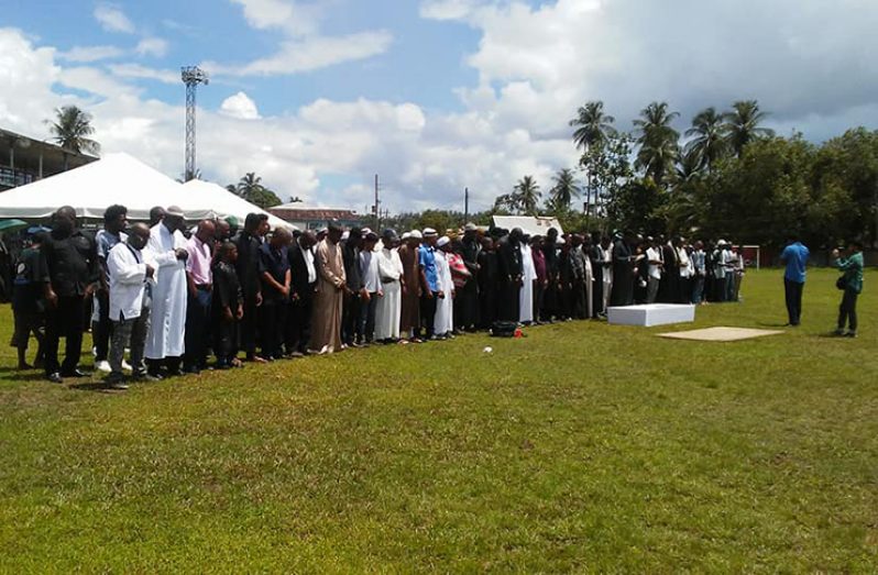 Muslim brothers and relatives at the janaaza (Muslim funeral prayer) for Abdul Kadir, held at the MSC ground in Linden