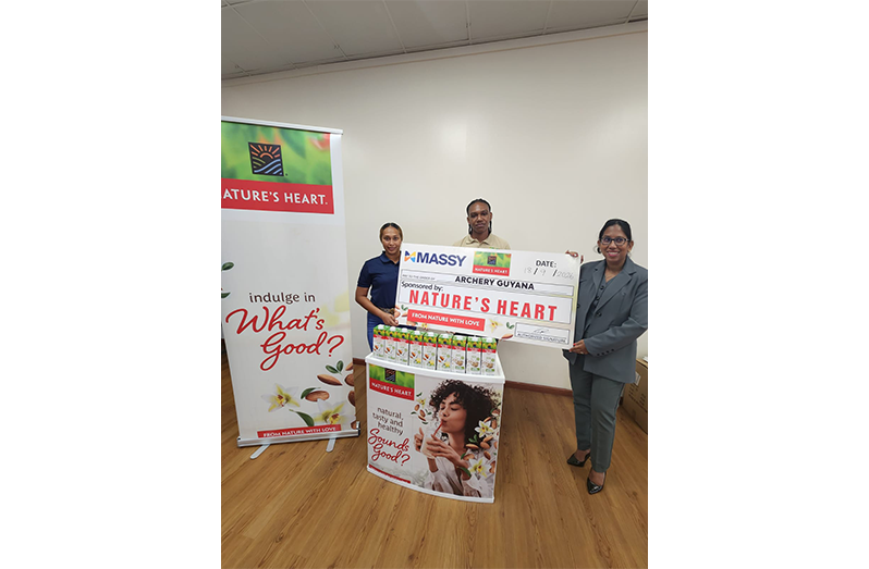 Representatives of Archery Guyana and Nestlé CARCAM brands Orchard and Nature’s Heart stand for a photo opportunity