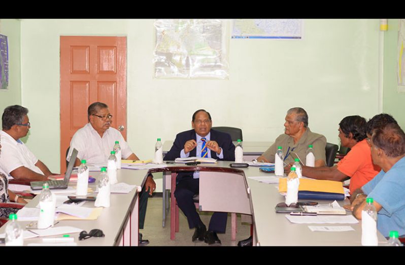 Prime Minister Moses Nagamootoo in a meeting with the CDC and National Task Force Commission members.