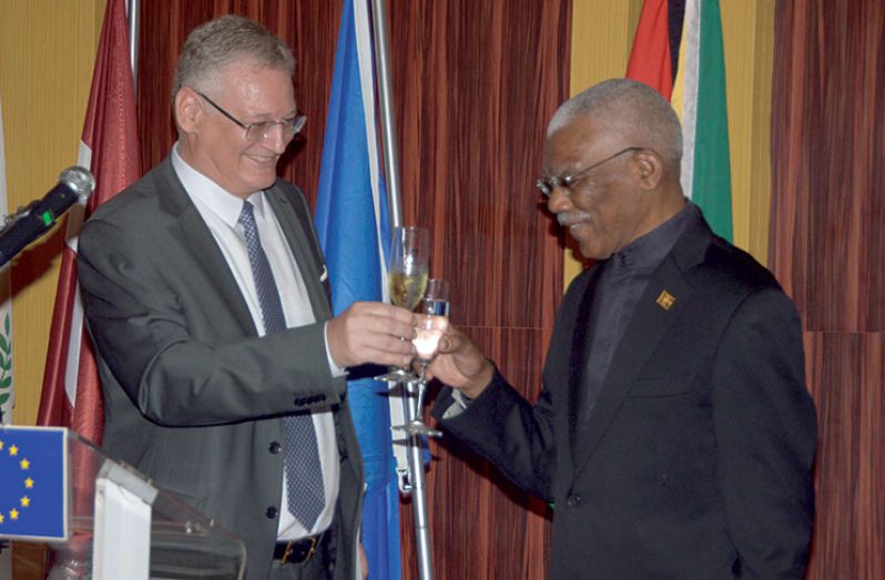 President David Granger shares a toast with European Ambassador to Guyana, Mr. Jernej Videtic at the
Europe Day celebrations Tuesday evening at the Pegasus Hotel (Adrian Narine photo)