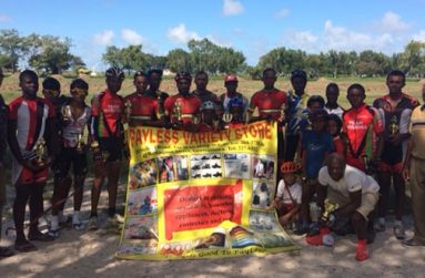 Prize winners of the various categories of the Payless Variety Store/Starr Party Rentals cycle programme strike a pose with Payless’ Managing Director Joseph Ramkumar extreme left and race organiser Hassan Mohamed extreme right, yesterday.