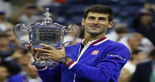 Novak Djokovic, of Serbia, holds the U.S. Open trophy after defeating Roger Federer of Switzerland in their men's singles final match, at the U.S. Open Championships tennis tournament in New York on Sunday. (Reuters/Shannon Stapleton)