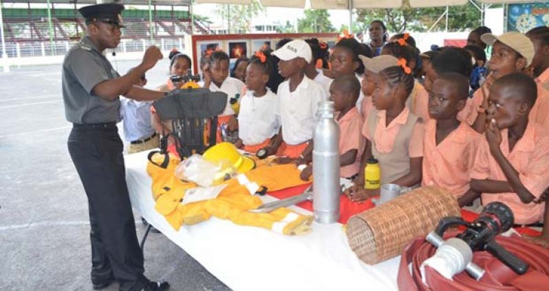 A Fire Service Officer speaking to students