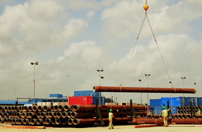 Some of the pipes being packed neatly into the racks (Adrian Narine photo)