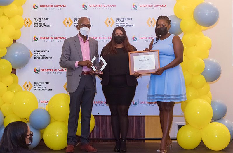 Sagacity Inc’s Senior Communications Specialist, Ahreefa Bacchus (centre) with Minister of Labour, Joseph Hamilton and Lavonia Springer, HSSE Coordinator, Centre for Local Business Development, at the HSSE Management System Mentorship Programme awards ceremony (OilNow photo)