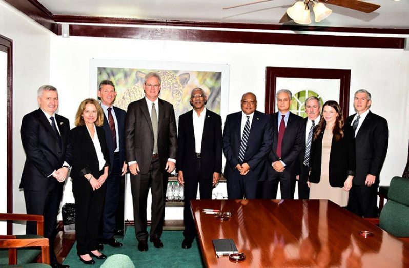 President David Granger and Minister of Natural Resources, Mr. Raphael Trotman,take a photo opportunity with ExxonMobil Officials. (From left) Mr. Mike Cousins, Executive Vice President ExxonMobil Exploration Company;Ms. Lisa Waters, Vice President ExxonMobil Development Company; Mr. Liam Mallon, President, ExxonMobil Development Company;Mr. Stephen Greenlee, President ExxonMobil Exploration Company;Presidential Advisor on Petroleum, Dr. Jan Mangal;Mr. Jeff Simons, ExxonMobil Guyana Country Manager;Ms. Kimberly Brasington, ExxonMobil Guyana Public and Government Affairs Manager and Mr. Rod Henson, Project Executive (Guyana Country Manager effective May 1)