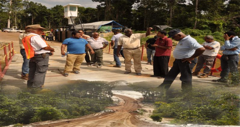 Public Works Minister Robeson Benn and other officials yesterday inspected works to facilitate crossing at the Essequibo River-end of Section Two of the Amaila Road, where works are almost complete. Pictured is a section of the access road from Mabura, leading to the Essequibo River .(See story in tomorrow’s issue)
(Photos by Delano Williams)