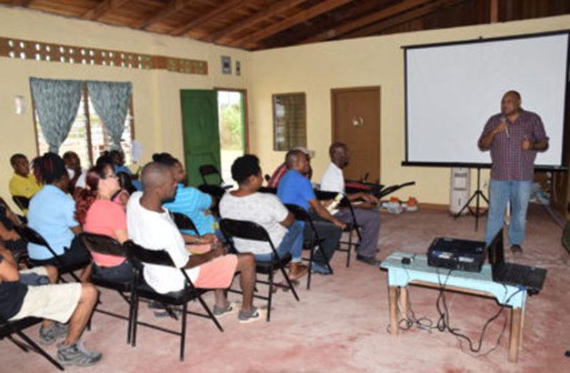 Minister of Natural Resources, Raphael Trotman, updating Kwakwani residents