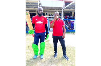 Malcom Morris (left) 112 from 60 ball and Garth Allen 4-10