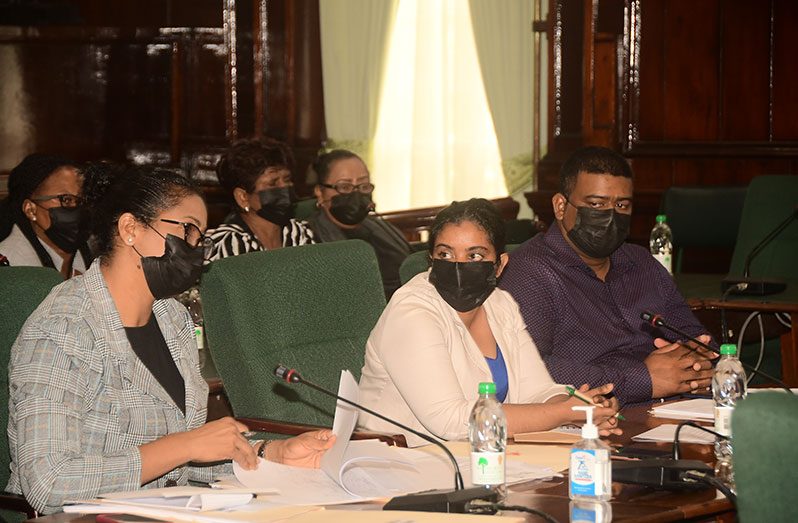 (From left) Region Two Chief Accountant Johan Seedyal, with REO Susannah Saywack and Regional Engineer Kawan Suchit appeared before the PAC (Adrian Narine photo)