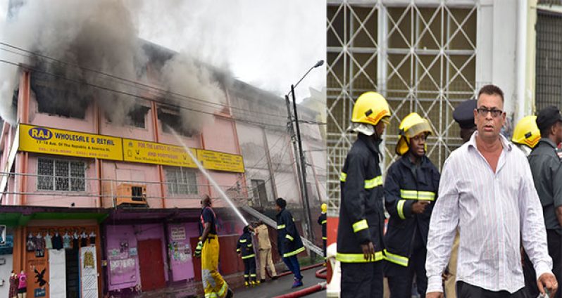 Owner of the gutted business complex, Rudat Persaud, looks on helplessly as firemen battle the blaze