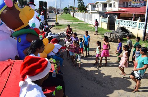 Goodies being shared out during the parade