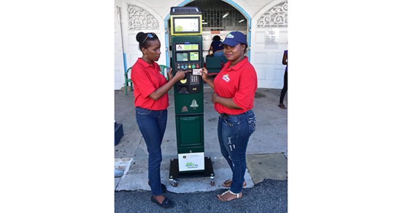 NPS representatives with one of the parking meters