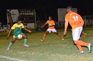 Part of the action of the GFF’s Stag Elite Beer tournament between Fruta Conquerors (orange top) and GDF at the Tucville ground on Friday evening. Fruta Conquerors won the game 5-2