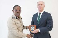 Commissioner of Police, Clifton Hicken with Acting Political Chief of the United States (U.S.) Embassy, Henry Rector