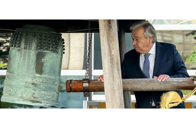 Secretary-General António Guterres rings the Peace Bell during the ceremony held at UN headquarters ahead of the September 21 observance of the International Day of Peace 2024 (UN Photo/Mark Garten)