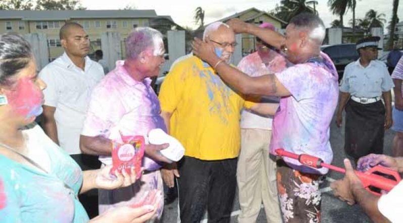 President Donald Ramotar interacting with persons at the Holi celebration