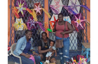 Carlotta Peters and her siblings at her kite-selling stand