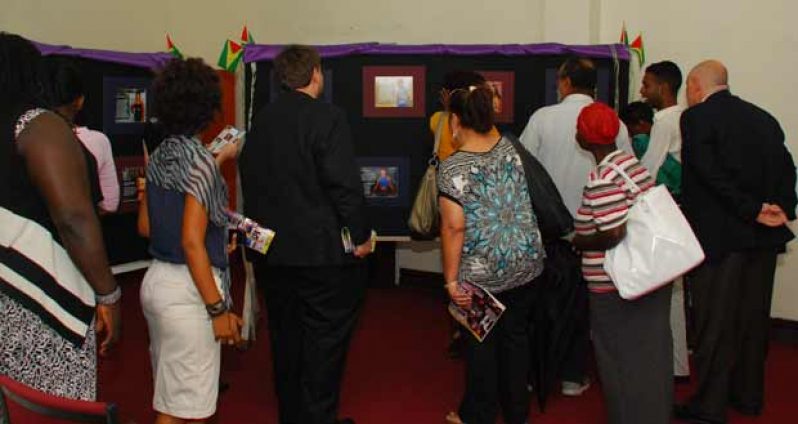 Participants viewing the photo-exhibition