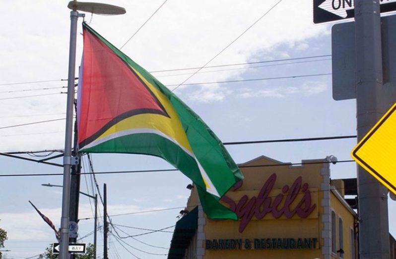 The Golden Arrowhead hoisted in Richmond Hill, Queens