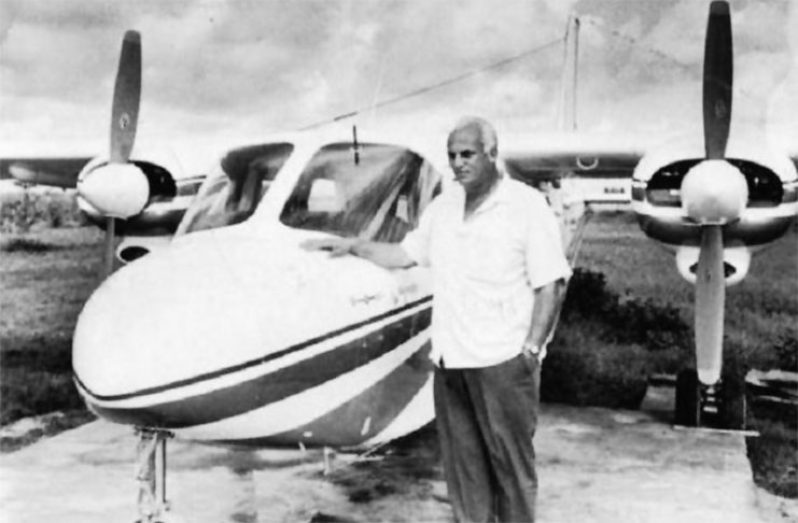 George standing next to his Britten-Norman Islander aircraft