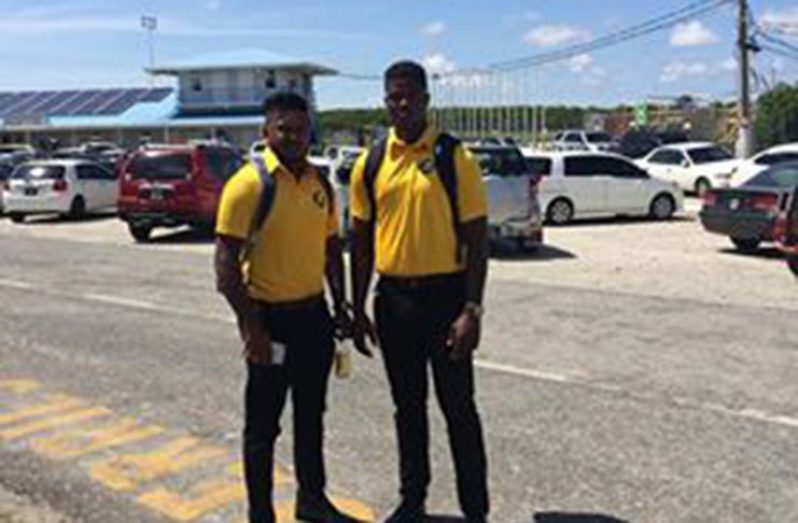 Chanderpaul Hemraj (left) and Romario Shepherd before they departed the Eugene F. Correia International Airport yesreday for Antigua. (Rajiv Bisnauth photo)