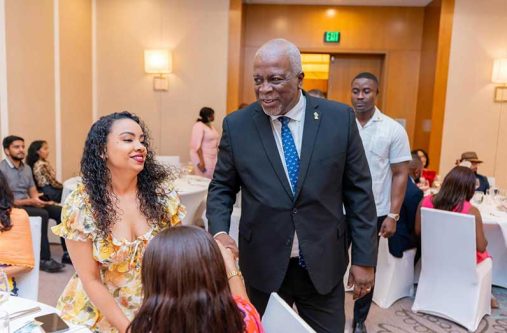 Prime Minister Brigadier (Ret’d) Mark Phillips interacting with persons at the Annual THAG Awards Dinner and Auction event (OPM photo)