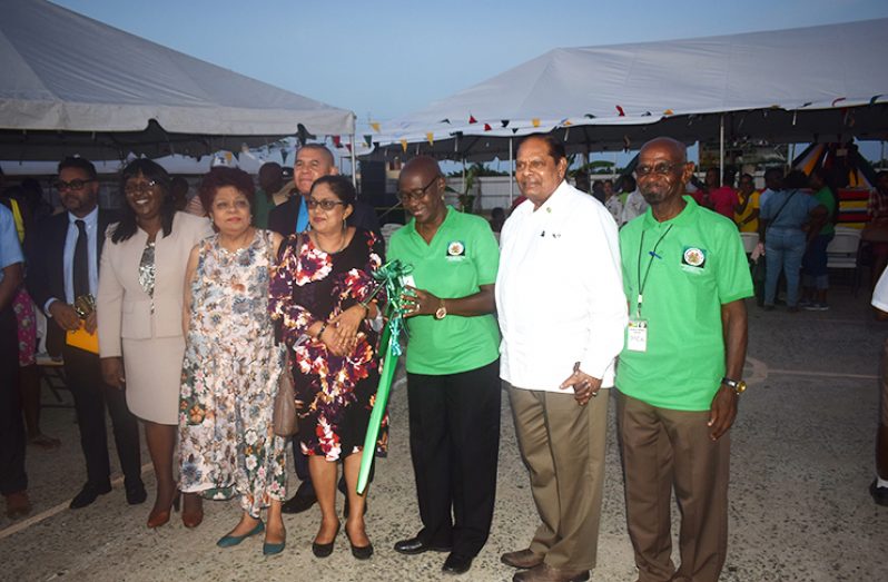 Prime Minister Moses Nagamootoo with wife Sita Nagamootoo, Social Protection Minister Amna Ally, Social Cohesion Minister Dr George Norton and others at the exhibition