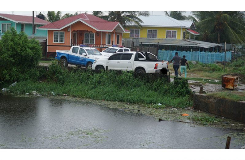 Law enforcement officers at Mahaica foreshore this morning.(Leroy Smith photo)