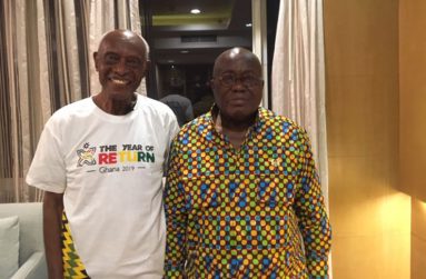 Farrier, wearing a Ghana "Year of Return" t-shirt,  photographed with the Ghanaian President