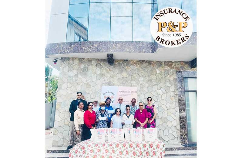 Recipients flanked by Vikash Panday and Mrs. Ahilia Panday