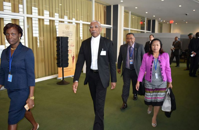 President David Granger, Minister of Public Affairs in the Ministry of the Presidency, Ms. Dawn Hastings-Williams and Permanent Representative
of Guyana to the United Nations, Ambassador Michael Ten-Pow, making their way to a meeting (Ministry of the Presidency photo)