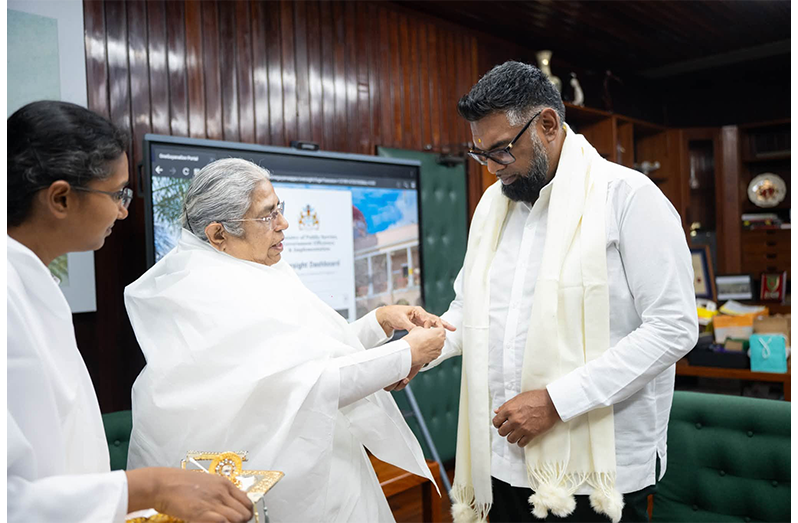 PRESIDENT, Dr Irfaan Ali on Friday celebrated Raksha Bandhan with representatives of the Indian High Commission in Guyana and the Brahma Kumaris. Raksha Bandhan celebrates the special bond of love between brothers and sisters. On this day, sisters tie rakhis around their brothers’ wrists as a symbol of protection against negative influences. In return, brothers offer gifts and promise to protect and support their sisters (Photos: President Irfaan Ali/Facebook)
