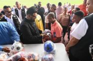 The Head of State hands over sport gears to football and cricket clubs in Region Three (DPI photos)