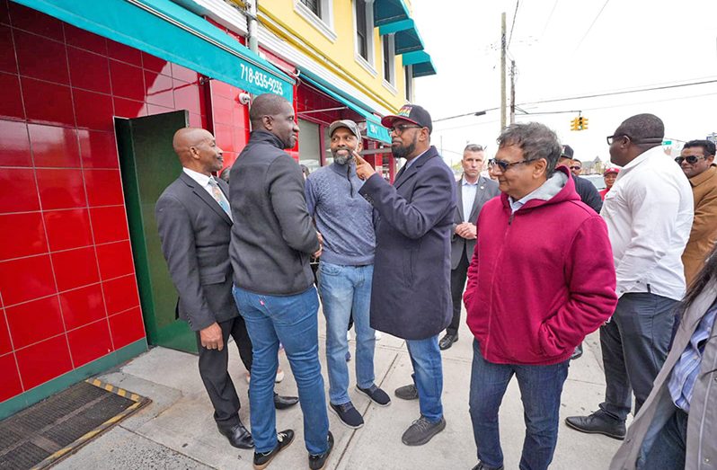 President Ali (centre) received a warm welcome from fellow Guyanese when he visited Brooklyn and Queens, New York last week (OP photo)
