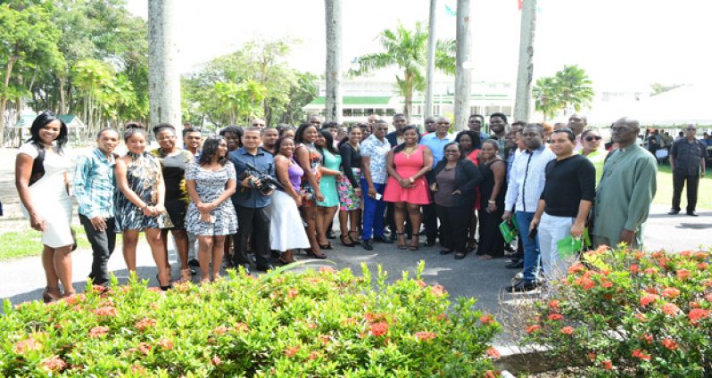 President David Granger with journalists at the Media Brunch hosted by the Ministry of the Presidency on the lawns of State House yesterday (Samuel Maughn photo)
