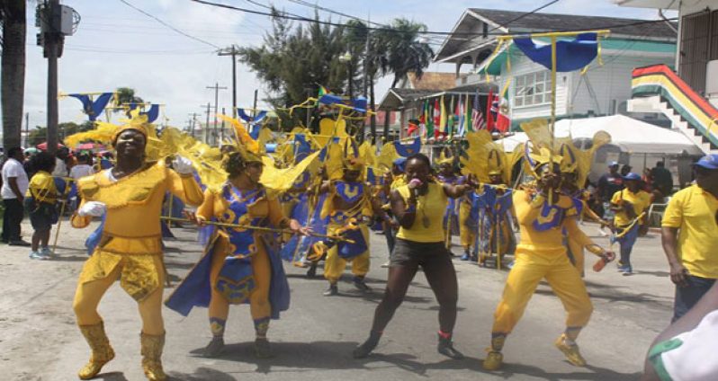 Education Minister, Priya Manickchand as a reveller on Mash Day with the Ministry’s costume designer and local Soca artiste, Melissa 'Vanilla' Roberts