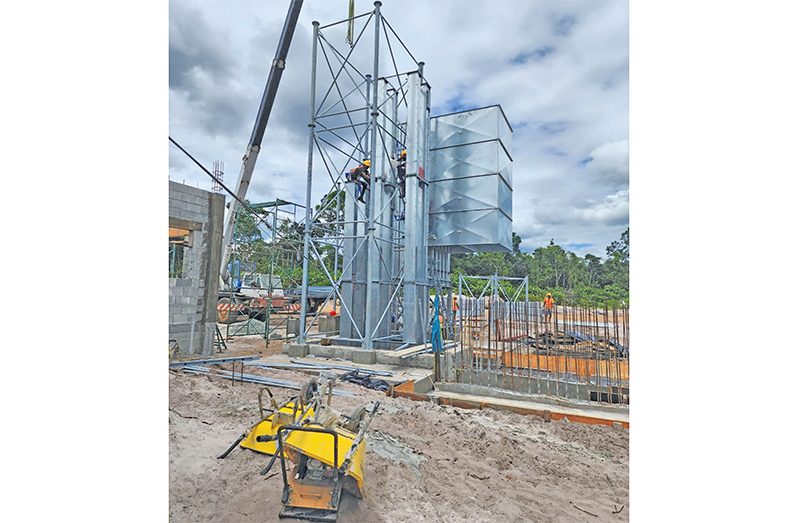 Progress and Progress 1: President, Dr Irfaan Ali has said that works are progressing rapidly on three 3,000-tonne silos and one 80-tonne-per-hour drying tower at Tacama Landing, along the Berbice River (Photos courtesy of President Ali’s Facebook page)