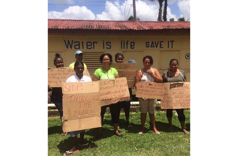 Kwakwani residents protesting the power shortage on Friday