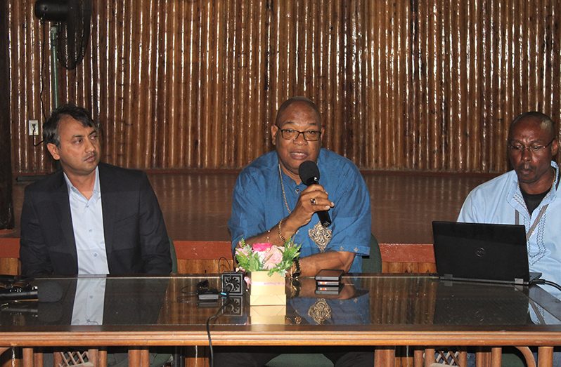 Minister of Public Works, Bishop Juan Edghill (centre) and bridge officials listen to the views of stakeholders, ahead of the three-day bridge closure (Japheth Savory photo)